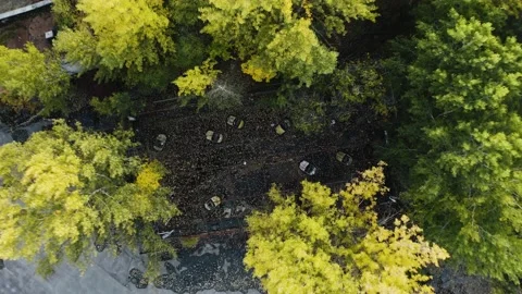 Aerial Drone view from decayed Autodrome with bumper cars in ghost town Pripyat Stock Footage 153366233
