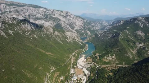 Aerial drone view of deep river canyon. River flowing between mountains. Stock Footage 312709256