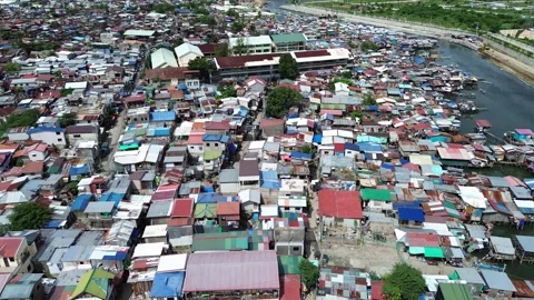 Aerial drone view of dense urban housing in Cebu City Philippines 02 Stock Footage 334050975