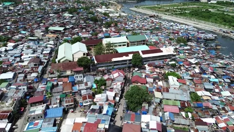 Aerial drone view of dense urban housing in Cebu City Philippines 03 Stock Footage 334051480