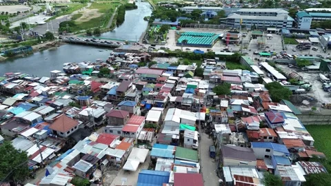 Aerial drone view of dense urban housing in Cebu City Philippines 06 Stock Footage 334051498