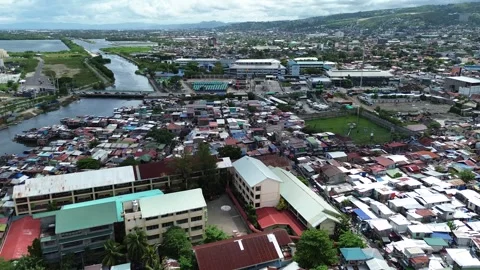 Aerial drone view of dense urban housing in Cebu City Philippines 04 Stock Footage 334053580