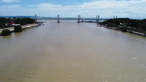 Aerial drone view of dense urban neighborhood and bridge in Davao Philippine Video stock 337513852