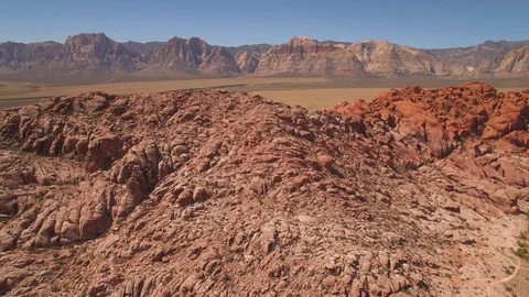 Aerial Drone view of desertic red rock mountain ridge and canyon near Las Vegas Video stock 100859722