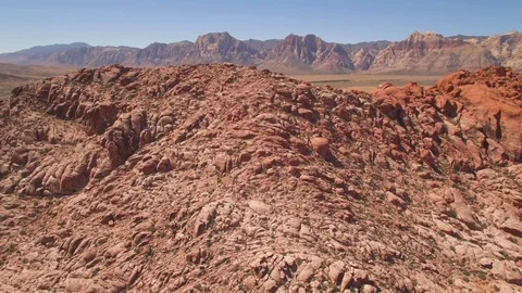 Aerial Drone view of desertic red rock mountain ridge and canyon near Las Vegas Video stock 100859802