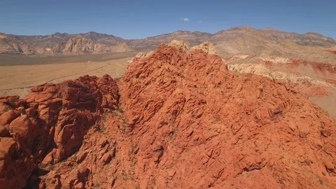 Aerial Drone view of desertic red rock mountain ridge and canyon near Las Vegas Video stock 100859823