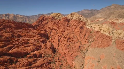 Aerial Drone view of desertic red rock mountain ridge and canyon near Las Vegas Video stock 100859967