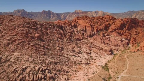 Aerial Drone view of desertic red rock mountain ridge and canyon near Las Vegas Video stock 100860003