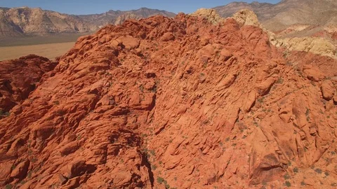 Aerial Drone view of desertic red rock mountain ridge and canyon near Las Vegas Video stock 100860110