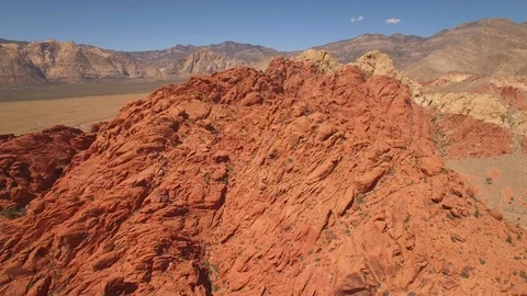 Aerial Drone view of desertic red rock mountain ridge and canyon near Las Vegas Video stock 100860130