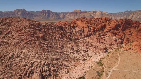 Aerial Drone view of desertic red rock mountain ridge and canyon near Las Vegas Video stock 100860195