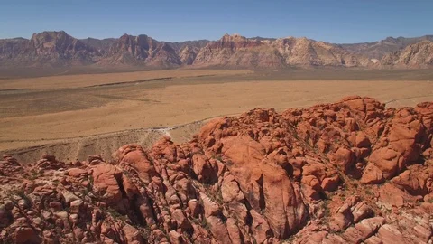 Aerial Drone view of desertic red rock mountain ridge and canyon near Las Vegas Video stock 100860275