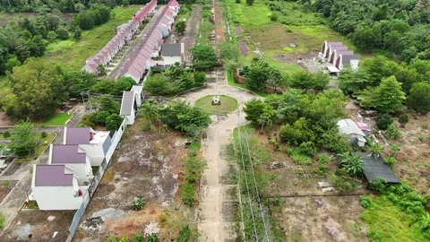 Aerial Drone View of Developing Residential Area with Roundabout Stock Footage 333495549