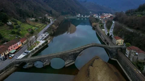 Aerial drone view Devil's Bridge Borgo a Mozzano Tuscany Italy Stock Footage 184647286