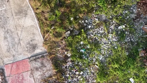 Aerial drone view of dilapidated building rubble and concrete Stock Footage 337993015