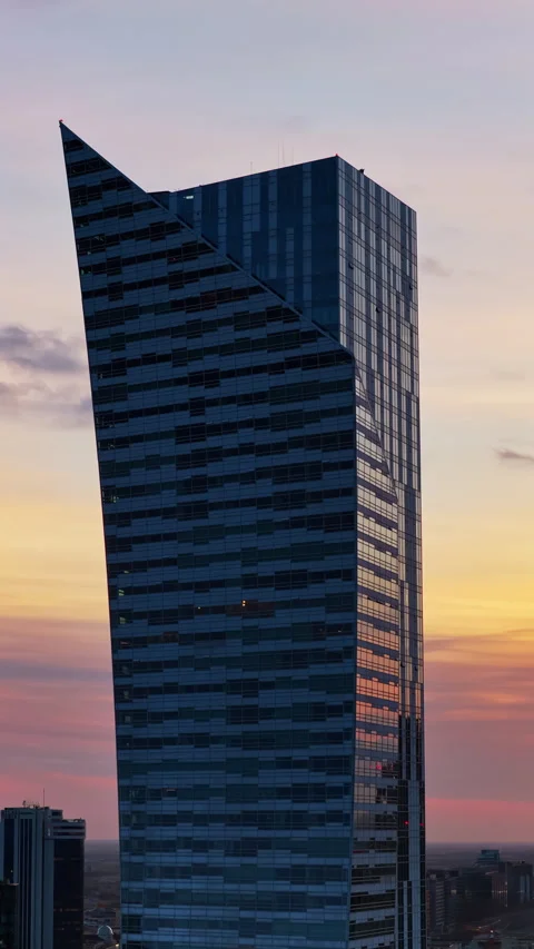 Aerial drone view of the distinctive angular Skyliner skyscraper, located at Video stock 323441719