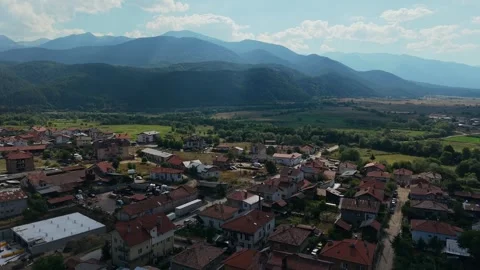 Aerial drone view of Dobrinishte town and mountains in Bulgaria Stock Footage 343514282