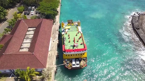 Aerial drone view of docking ferry. Ferry transports cars, motorcycles, people Vídeo Stock 219323721