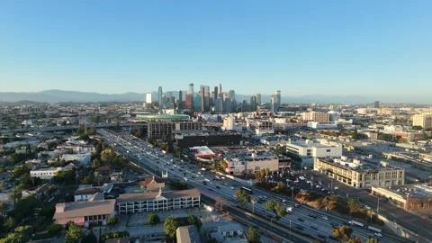 Aerial Drone View of Downtown Los Angeles Skyline and Freeway Traffic Vídeo Stock 340656640