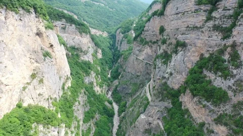 Aerial drone view of the dramatic Cherek Gorge in the Caucasus Stock Footage 338014870