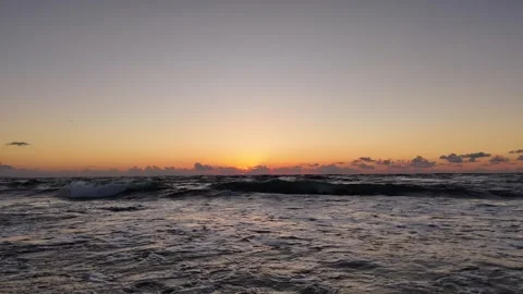 Aerial drone view of dramatic dark sunset over ocean. Stock Footage 339507962