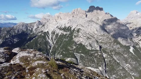 Aerial drone view of dramatic limestone peaks in the Dolomites Italy Stock Footage 330803056