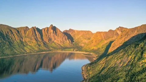 Aerial drone view of dramatic Senja Okshornan mountain Stock Photos