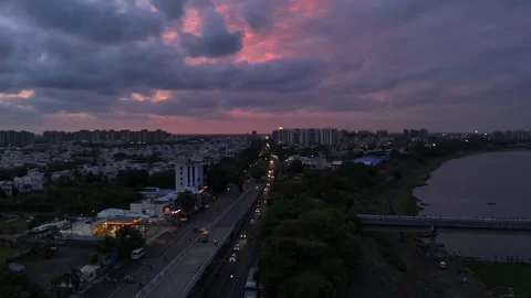 Aerial Drone View of Dramatic Sunset Clouds Over City Skyline, Stock-Footage 338297864
