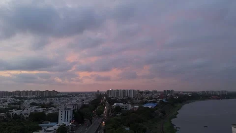 Aerial Drone View of Dramatic Sunset Sky Over Modern City Skyline Stock-Footage 338297876