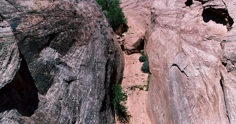Aerial drone view of a dried riverbed and plants at Capitol Reef Stock Footage 95605811