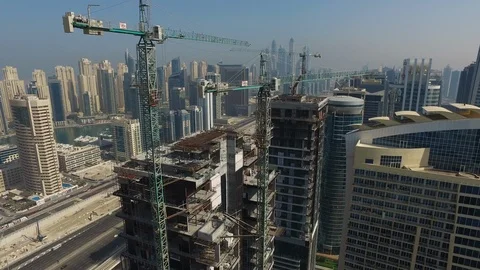 Aerial drone view of Dubai Marina and construction skyscraper with crane Stock Footage 100856465