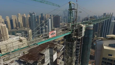 Aerial drone view of Dubai Marina and construction skyscraper with crane Stock Footage 100856470