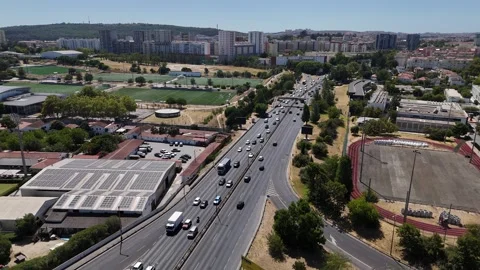 Aerial drone view of E1 highway in Lisbon, Portugal looking westwards Stock Footage 315885749