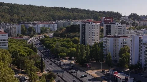 Aerial drone view of E1 highway in Lisbon, Portugal looking westwards Stock Footage 315885755