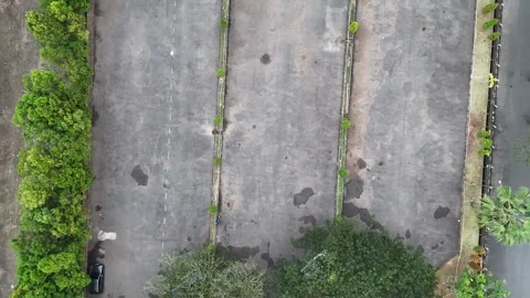 Aerial Drone View of Empty Asphalt Parking Lot and Trees 스톡 동영상 346938510