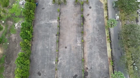 Aerial Drone View of Empty Asphalt Parking Lot and Trees 스톡 동영상 346938514