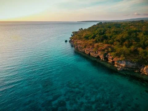 Aerial drone view of an empty beach in tropical Moyo Island, Indonesia 스톡 사진