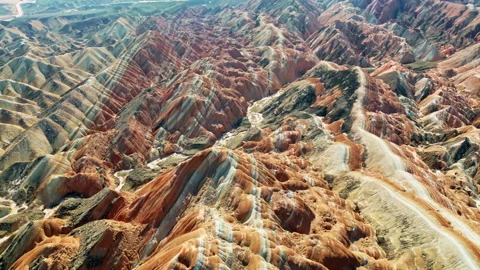 Aerial drone view of eroded sandstone ridges in Zhangye Danxia National Geopark, Stock Footage 330768353