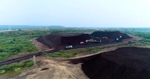 Aerial Drone View of Excavator Loading Coal with Transportation in India Stock Footage 340950525