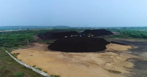 Aerial Drone View of Excavator Loading Coal with Transportation in India Stock Footage 340950535