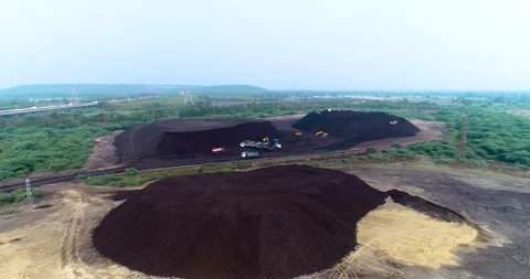 Aerial Drone View of Excavator Loading Coal with Transportation in India Stock Footage 340950710