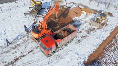 Aerial drone view of excavators loading truck with stone. Stock Footage 233153904