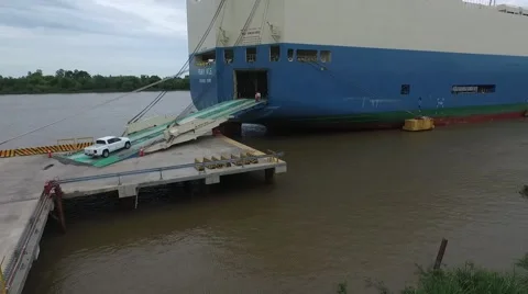 Aerial drone view from an export  cargo ship that it's been loaded with pick up Vídeo Stock 62835660