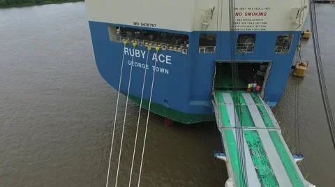 Aerial drone view from an export  cargo ship that it's been loaded with pick up Vídeo Stock 62835710