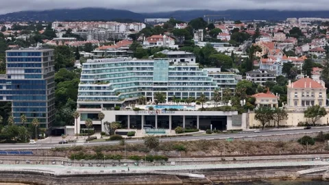 Aerial drone view of facade of luxury Hotel Cascais Miragem in Cascais, Portugal Stock Footage 279026330