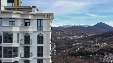 Aerial drone view of facade of modern typical new residential building with Vidéo 147927236