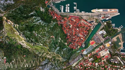Aerial drone view of the famous zig zag hiking path leading to the fortress, Stock Footage 324553422