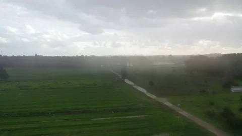 Aerial drone view of feilds in a rainy day Stock Footage 170887879