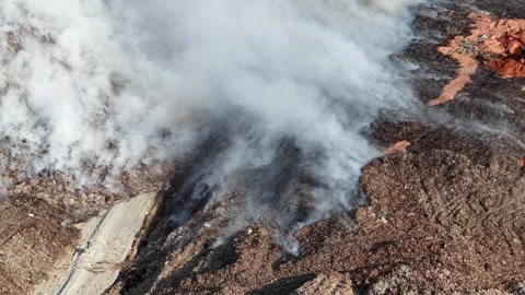 Aerial drone view of fire burning at landfill site 库存影片 337724955