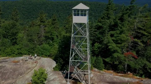Aerial drone view of a fire tower in the Adirondack Mountains. Video stock 92805208